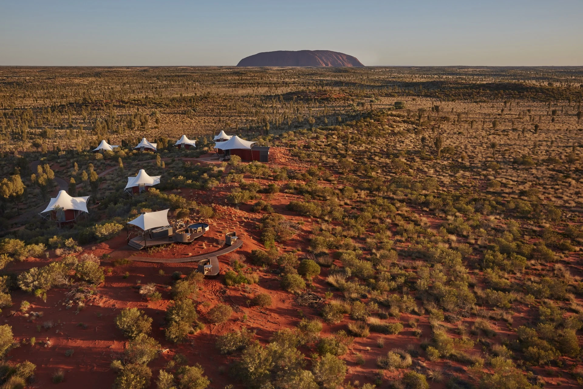 Longitude 131 View over luxury tents and Uluru